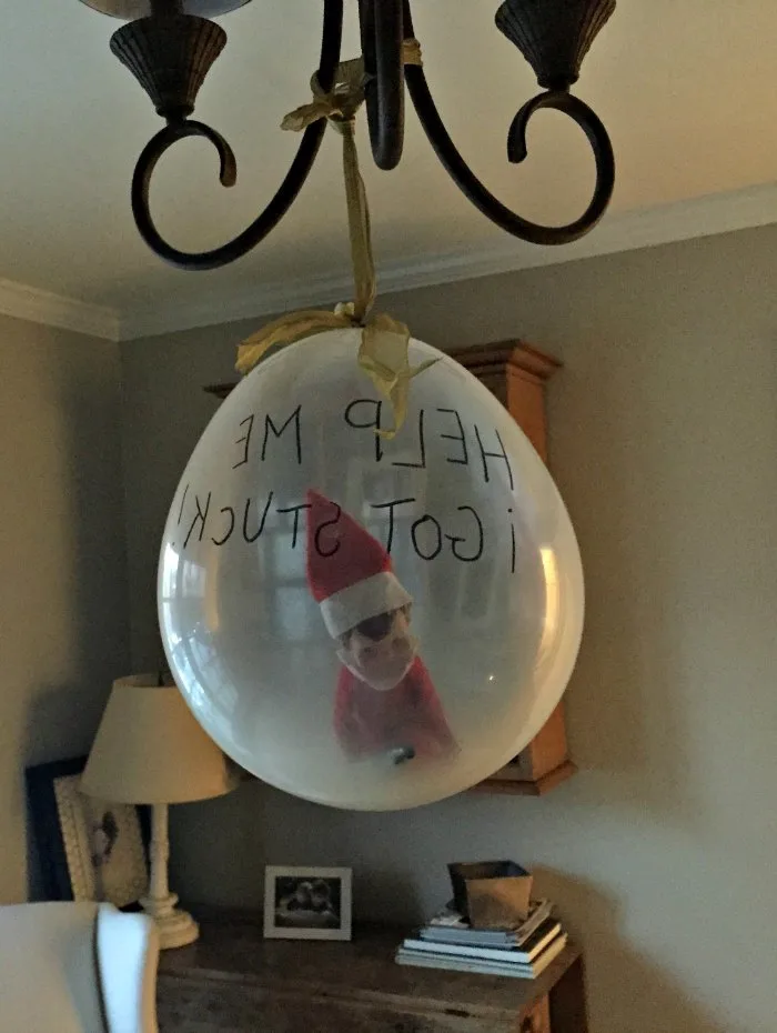 elf stuck inside a balloon