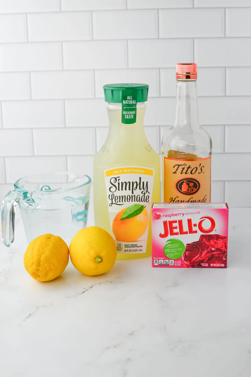 raspberry lemonade jello shot ingredients on table